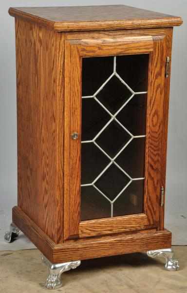 Appraisal: Oak Slot Machine Stand with Cast Iron Feet Description Glass