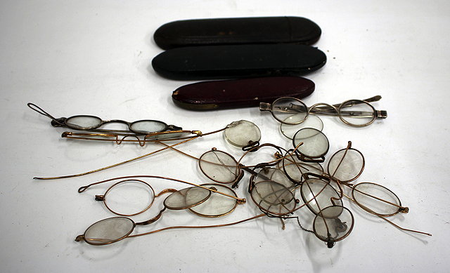 Appraisal: TWO PAIRS OF GEORGIAN SILVER SPECTACLES together with a further