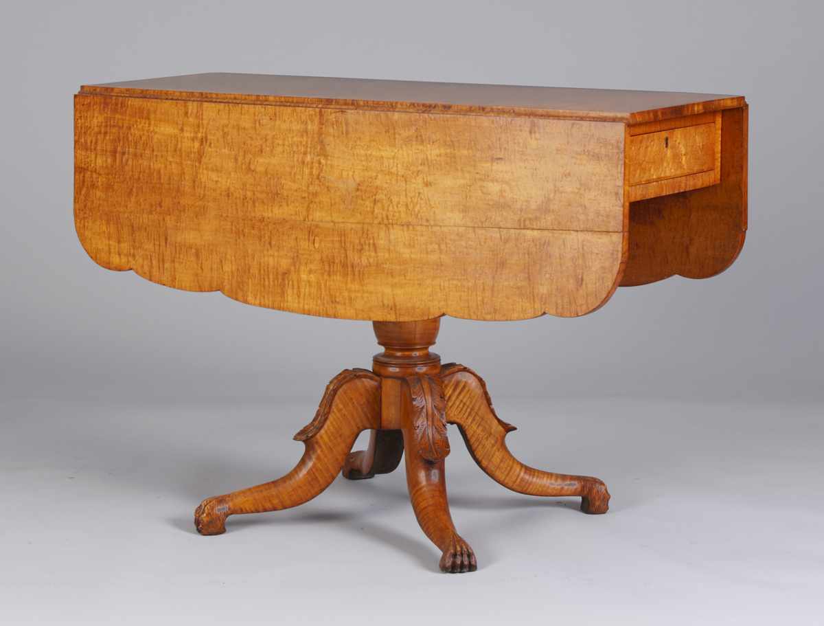 Appraisal: Unusual NYS Tiger Maple Drop Leaf Table Carved base paw