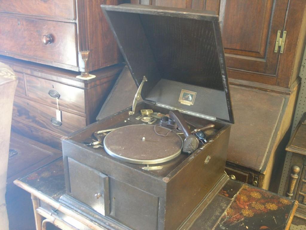 Appraisal: An HMV portable gramophone table-top model in dark oak case