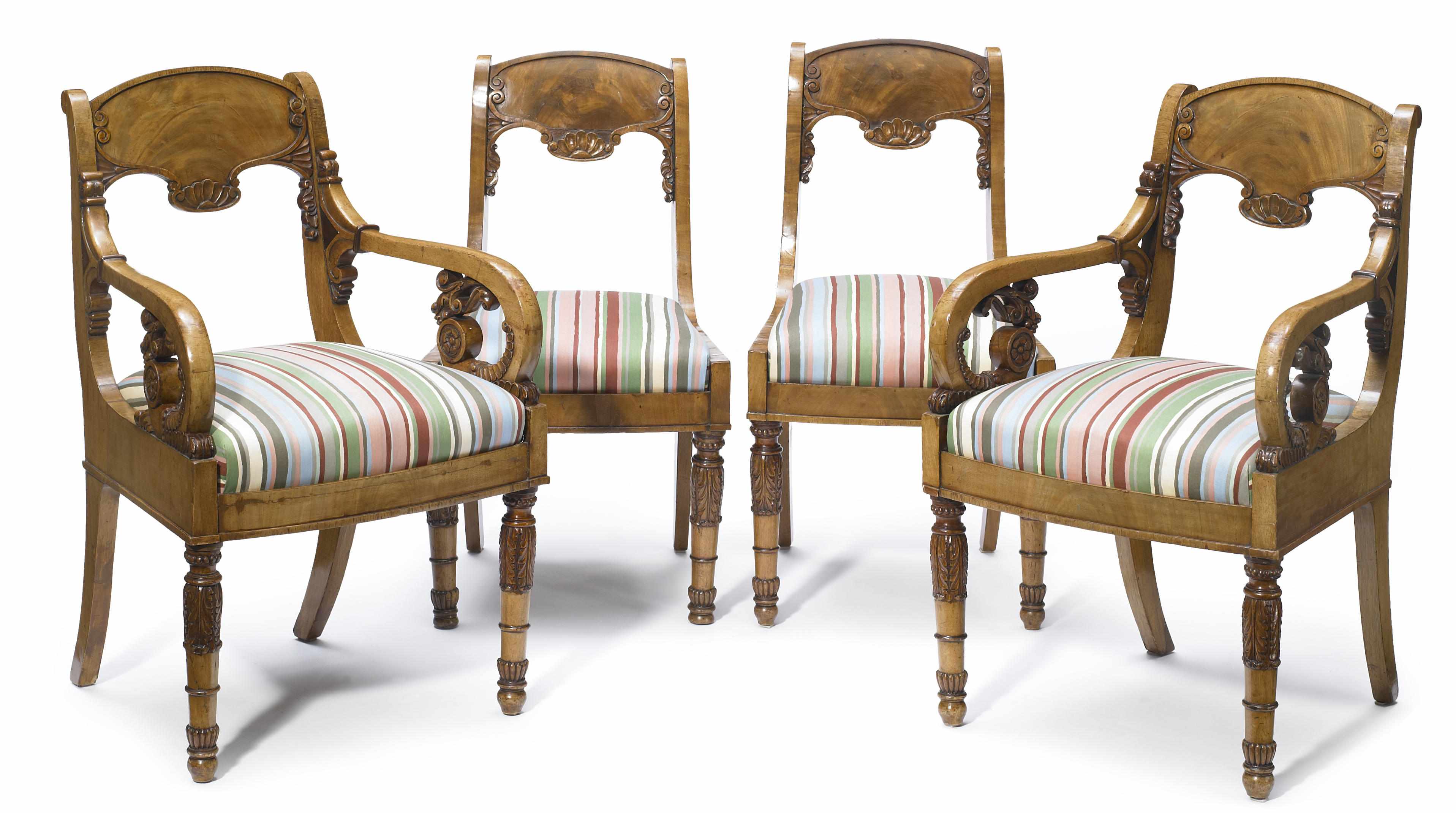 Appraisal: A suite of four Neoclassical carved mahogany chairs possibly Russian