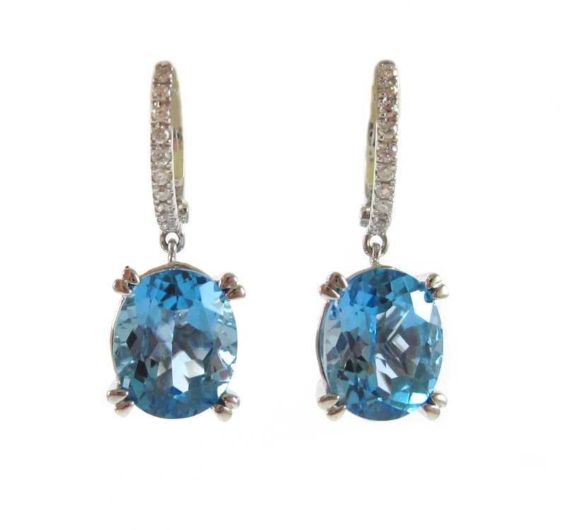 Appraisal: PAIR OF BLUE TOPAZ AND DIAMOND EARRINGS each k white