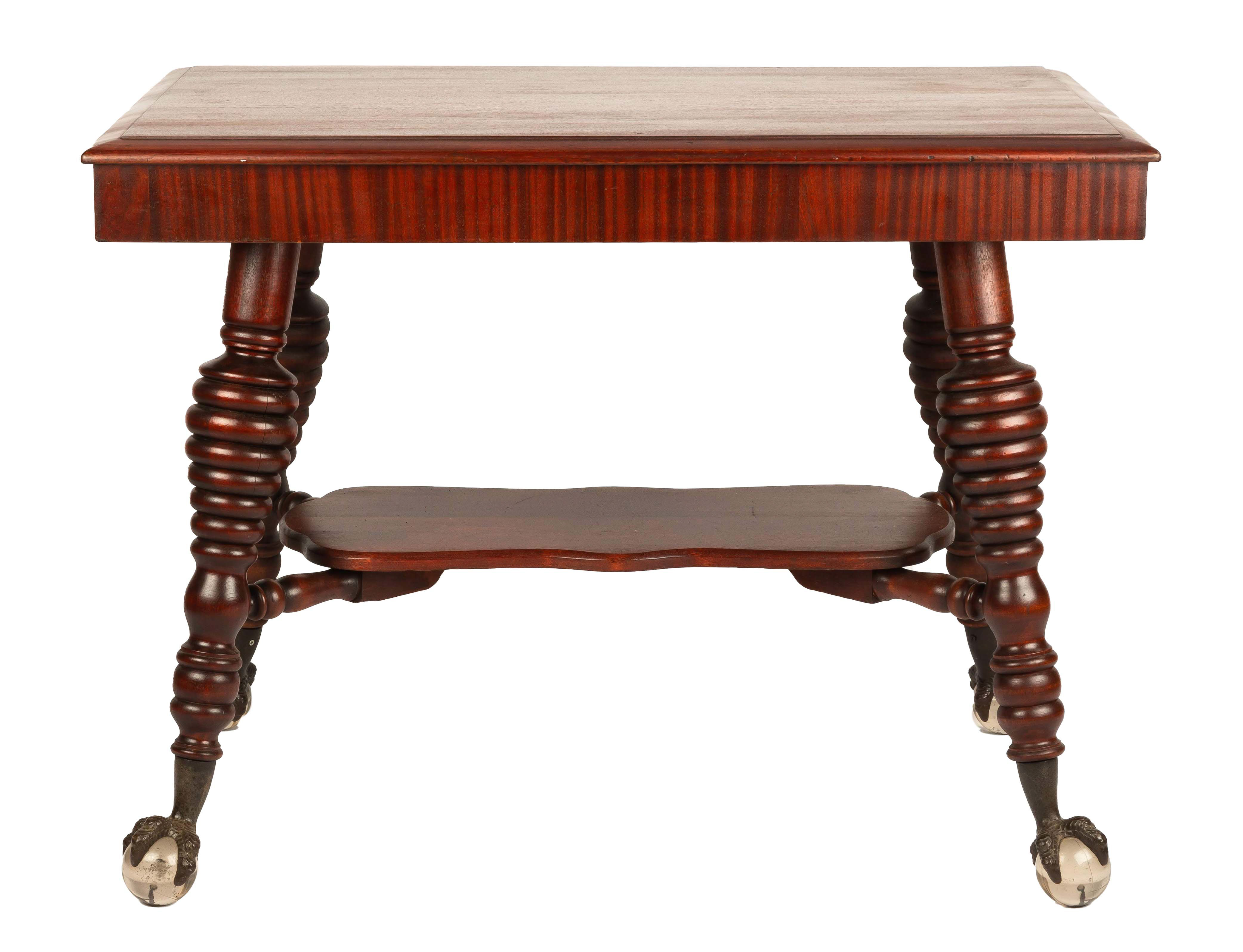 Appraisal: MAHOGANY CENTER TABLE Turned legs with brass and glass claw