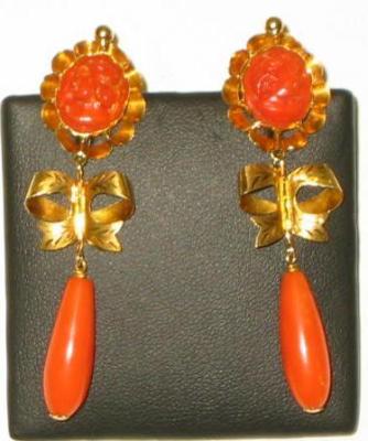 Appraisal: A PAIR OF CORAL PENDANT EARRINGS comprising pink coral drop