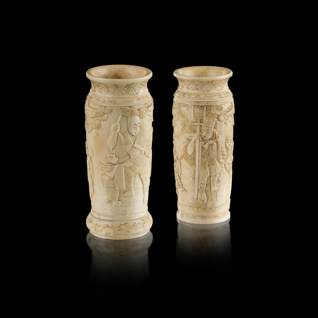 Appraisal: YNEAR PAIR OF CARVED BONE VASES MEIJI PERIOD of cylindrical