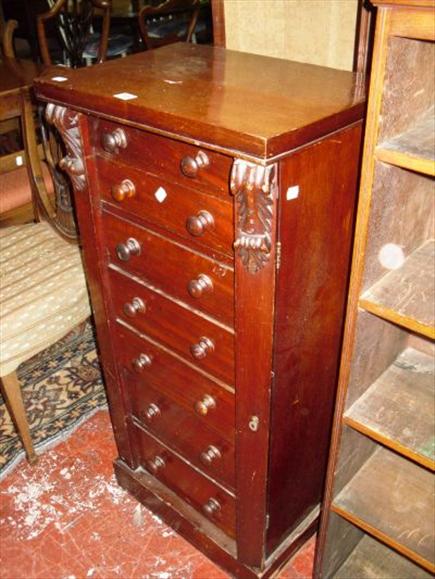 Appraisal: A Victorian seven drawer mahogany Wellington chest