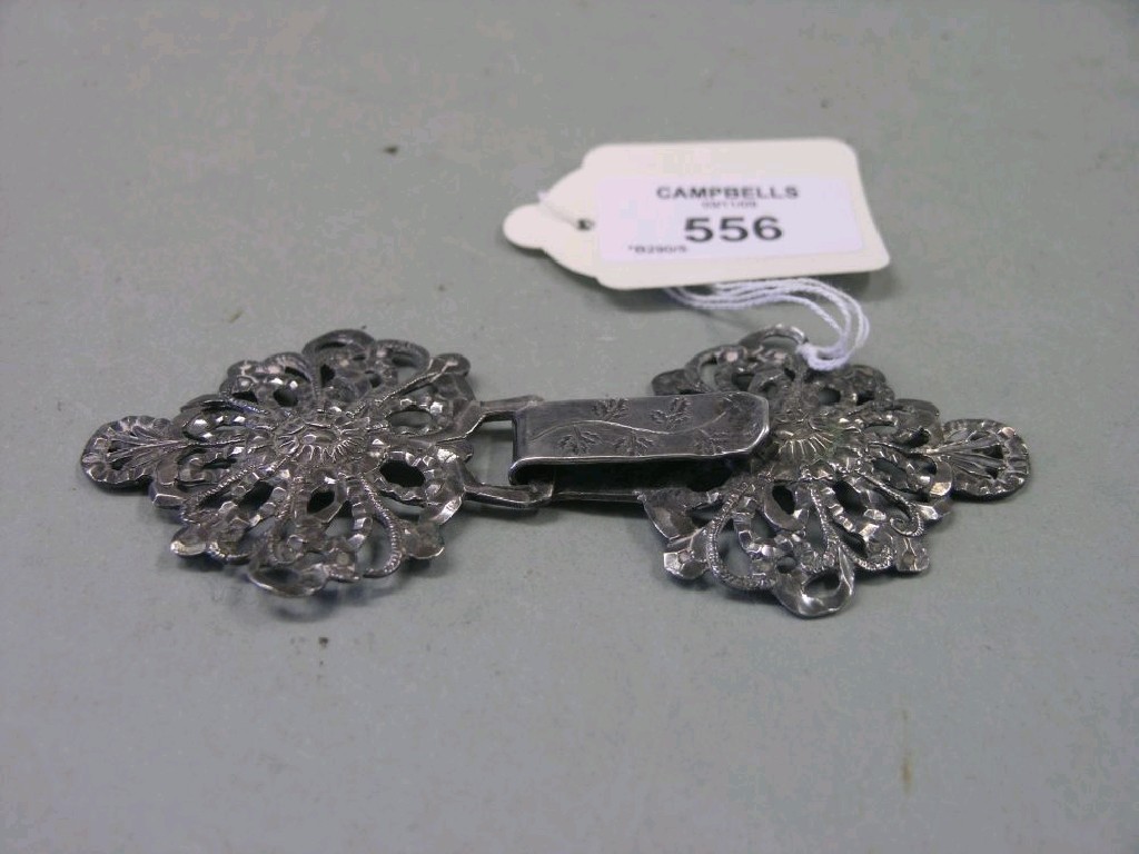 Appraisal: A continental silver nurses's belt-buckle in two sections in long