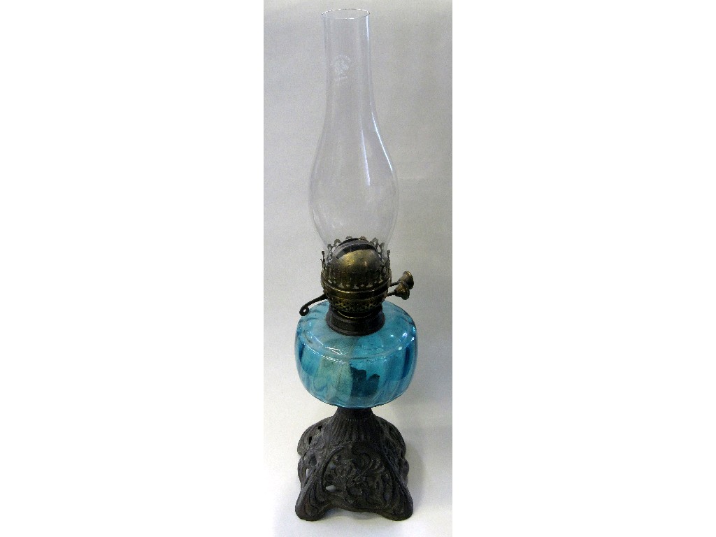 Appraisal: Victorian cast iron paraffin lamp with blue glass reservoir