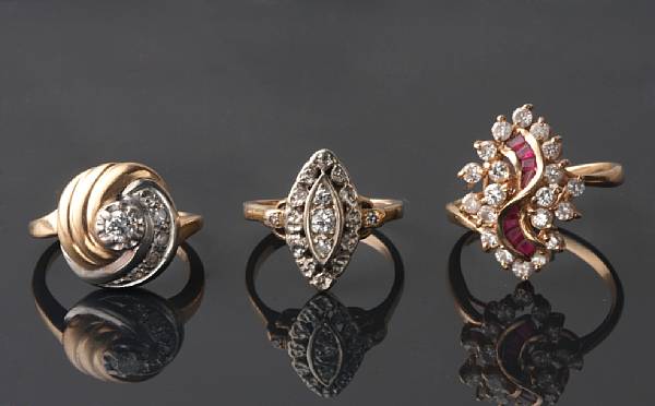 Appraisal: A collection of four gem-set diamond and gold rings estimated