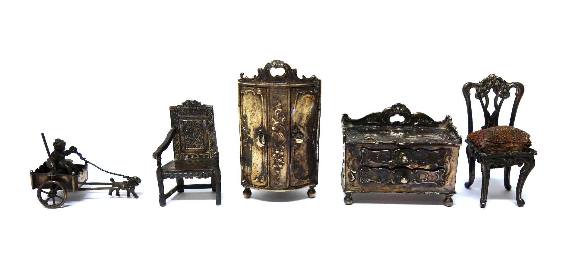 Appraisal: Five mostly silver miniature items comprising a corner cupboard raised