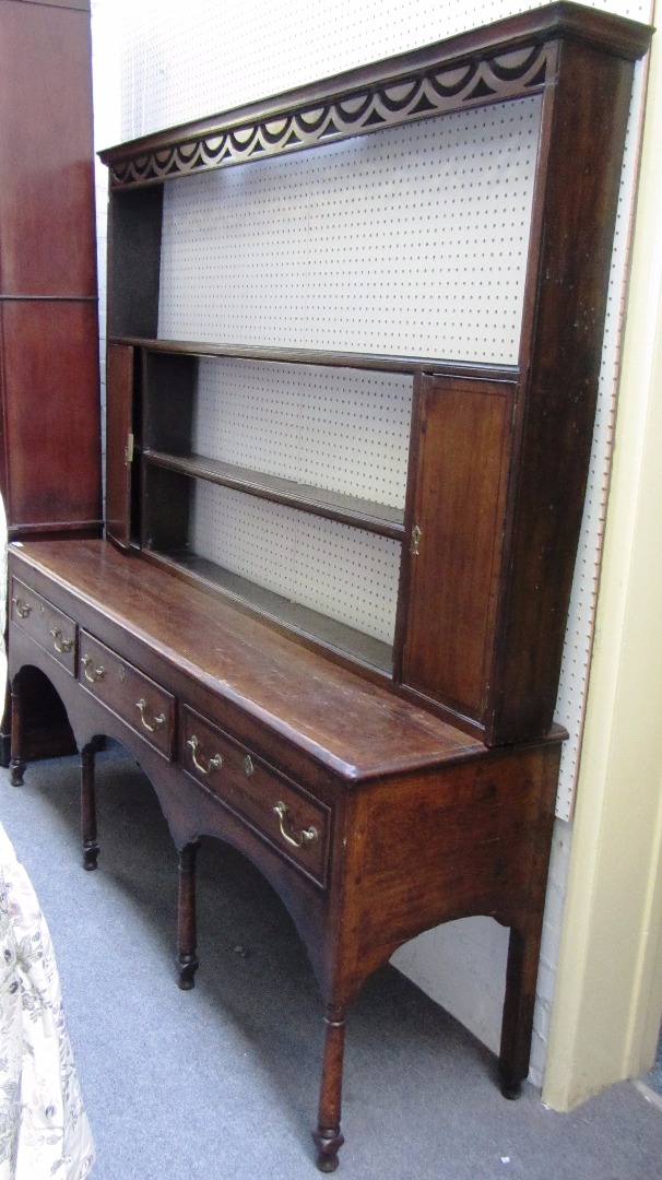 Appraisal: An th century oak dresser the open three tier plate