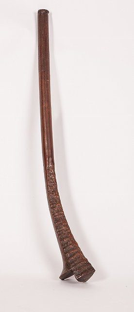 Appraisal: A FIJIAN CARVED WOODEN GUN STOCK CLUB with natural decoration