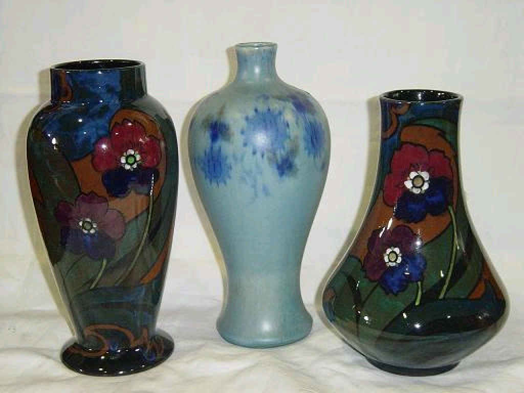 Appraisal: Two Decoro vases with painted anemone decoration in purple blue