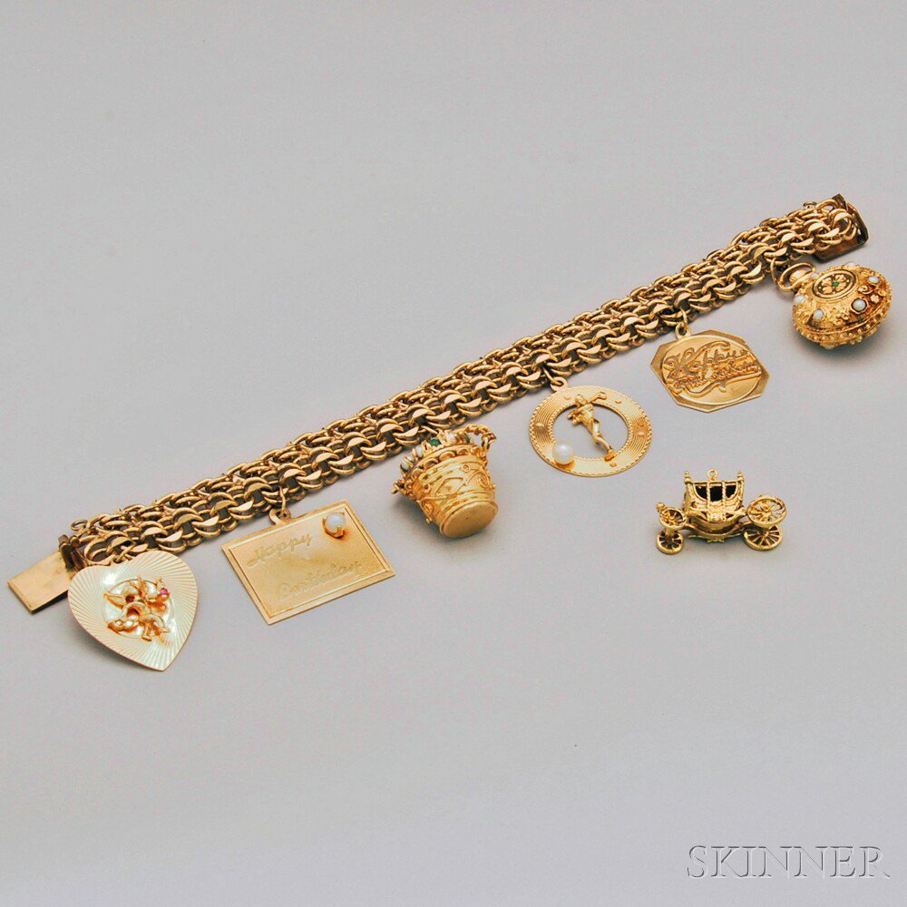 Appraisal: Gold-filled Charm Bracelet with Group of Mostly Gold Charms including