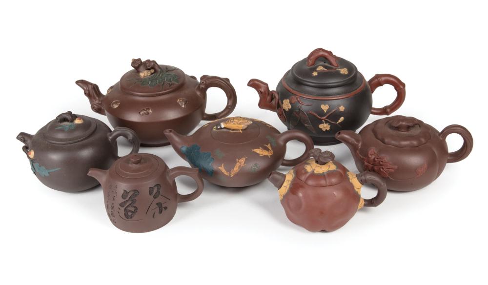 Appraisal: Seven Chinese Yixing Pottery Teapots th c variously marked some