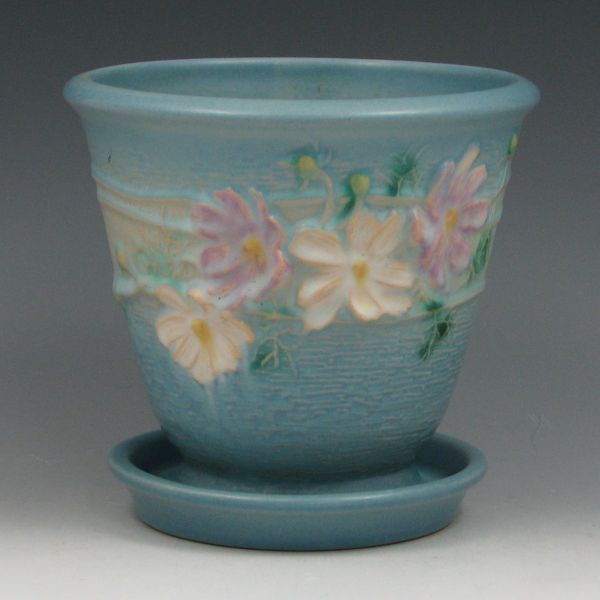 Appraisal: Roseville Cosmos flower pot and matching saucer in blue Pot