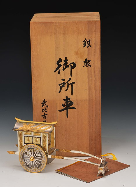 Appraisal: A Japanese silver and gold coloured model of a ceremonial