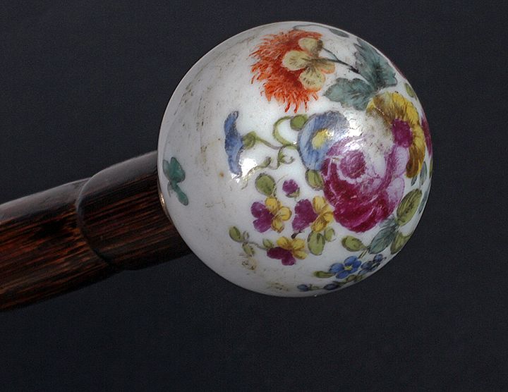 Appraisal: Porcelain Dress Cane Ca - A beautifully painted round porcelain