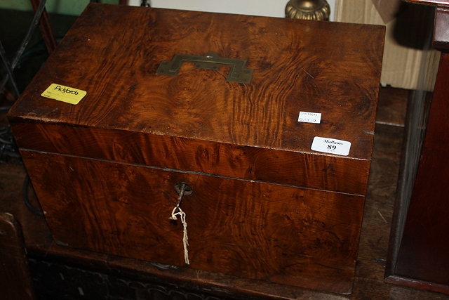 Appraisal: A VICTORIAN FIGURED WALNUT LARGE CAMPAIGN BOX with sunk brass