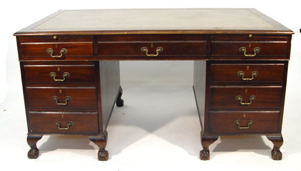 Appraisal: Reproduction mahogany twin pedestal desk with red tooled leather insert