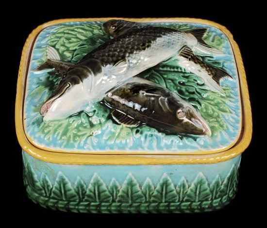 Appraisal: A George Jones majolica sardine box and cover with fish