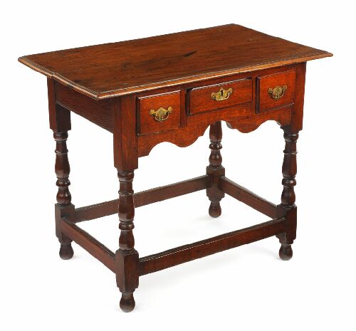 Appraisal: An early th century oak lowboy the moulded rectangular top