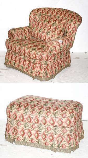 Appraisal: An upholstered club chair and ottoman