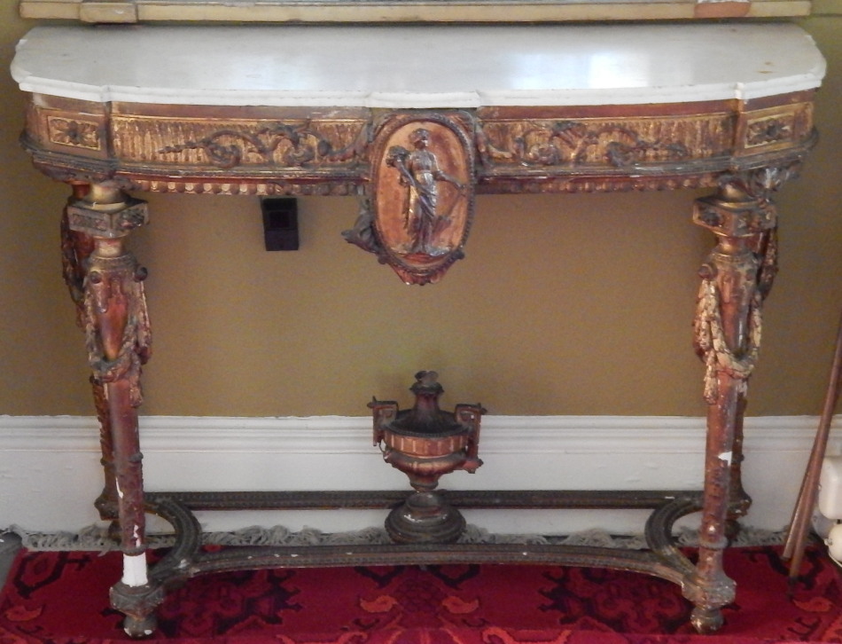 Appraisal: A thC gilt gesso console table with a shaped white