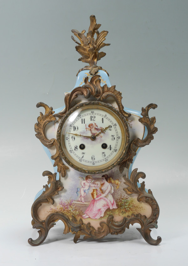 Appraisal: FRENCH ORMOLU MOUNTED PORCELAIN MANTLE CLOCK Gilt decorated foliate motif