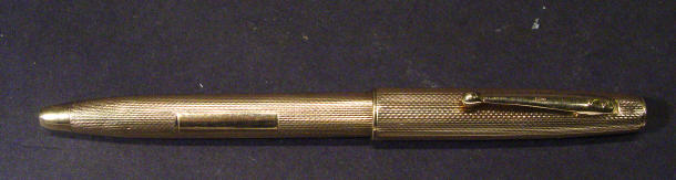 Appraisal: ct gold ballpoint pen with engine turned decoration