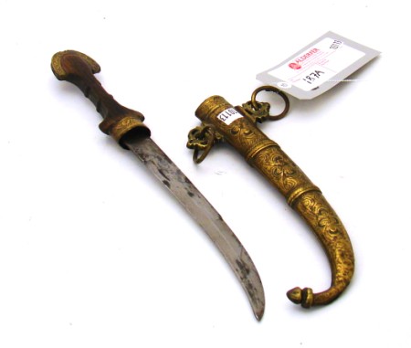 Appraisal: Short curve bladed dagger with wood grip and brass fittings