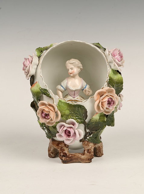 Appraisal: A SITZENDORF PORCELAIN MODEL of a girl within an egg