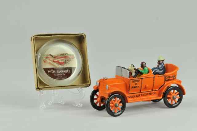 Appraisal: DENT AMOS 'N ANDY TAXICAB PAPERWEIGHT Cast iron classic later