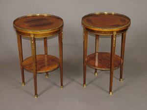 Appraisal: A pair of rosewood and inlaid circular two tier occasional