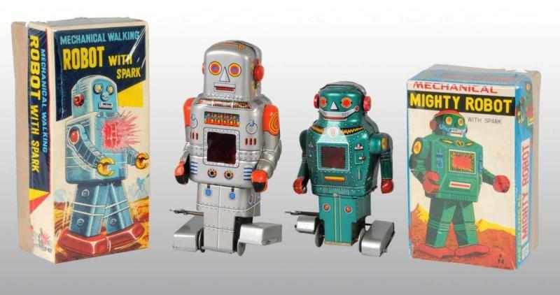 Appraisal: Lot of Tin Robot Wind-Up Toys Description Japanese Working Includes