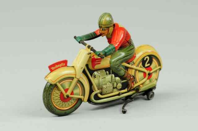 Appraisal: TRICK MOTORCYCLE Technofix Germany boxed example lithographed tin colorful clockwork