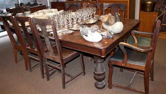 Appraisal: Jacobean Revival style oak dining table with a set of