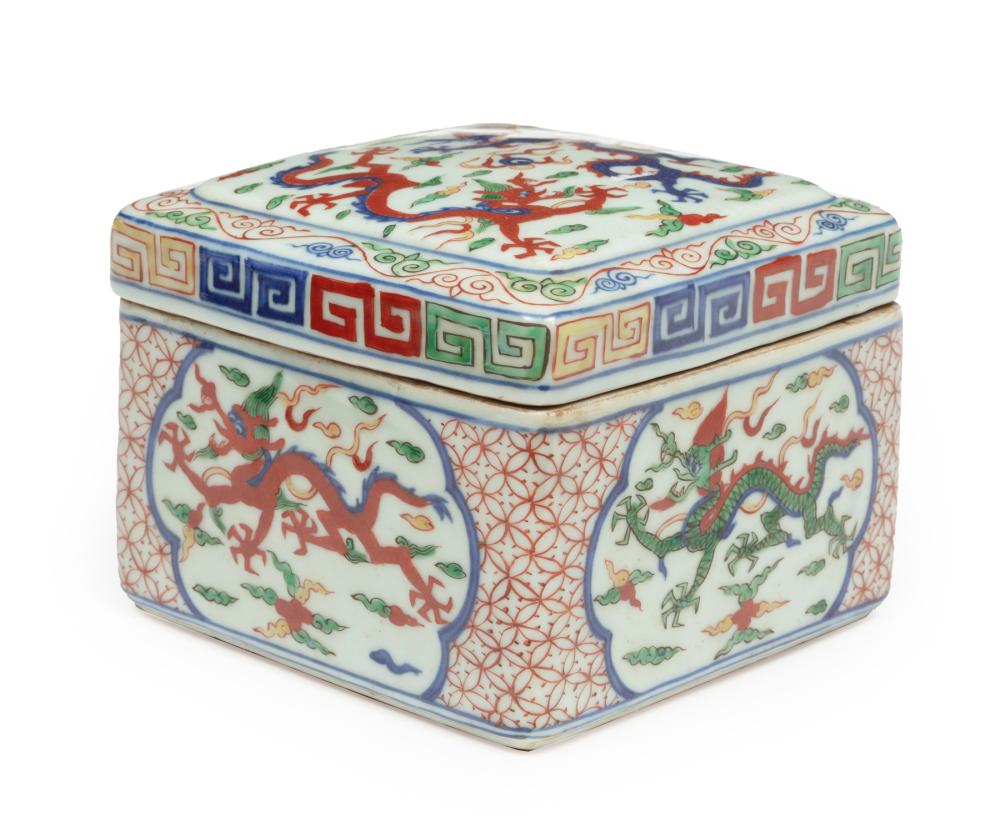 Appraisal: Chinese Wucai Porcelain Covered Box decorated with dragons in pursuit