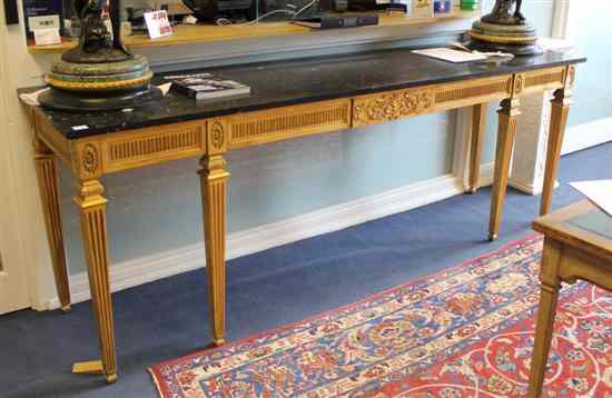 Appraisal: A George III design carved and giltwood console table with