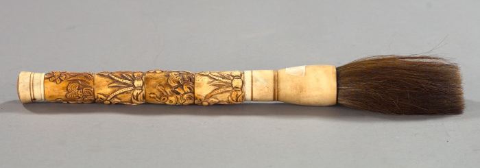 Appraisal: Large Chinese Carved Antiqued and Polished Bone-Mounted Badger Hair Calligrapher's