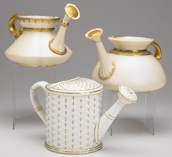 Appraisal: ROYAL WORCESTER Three watering pitchers two with ram s head