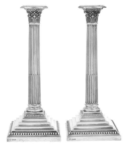 Appraisal: A PAIR OF STERLING SILVER CORINTHIAN COLUMN CANDLESTICKS HAWKSWORTH EYRE