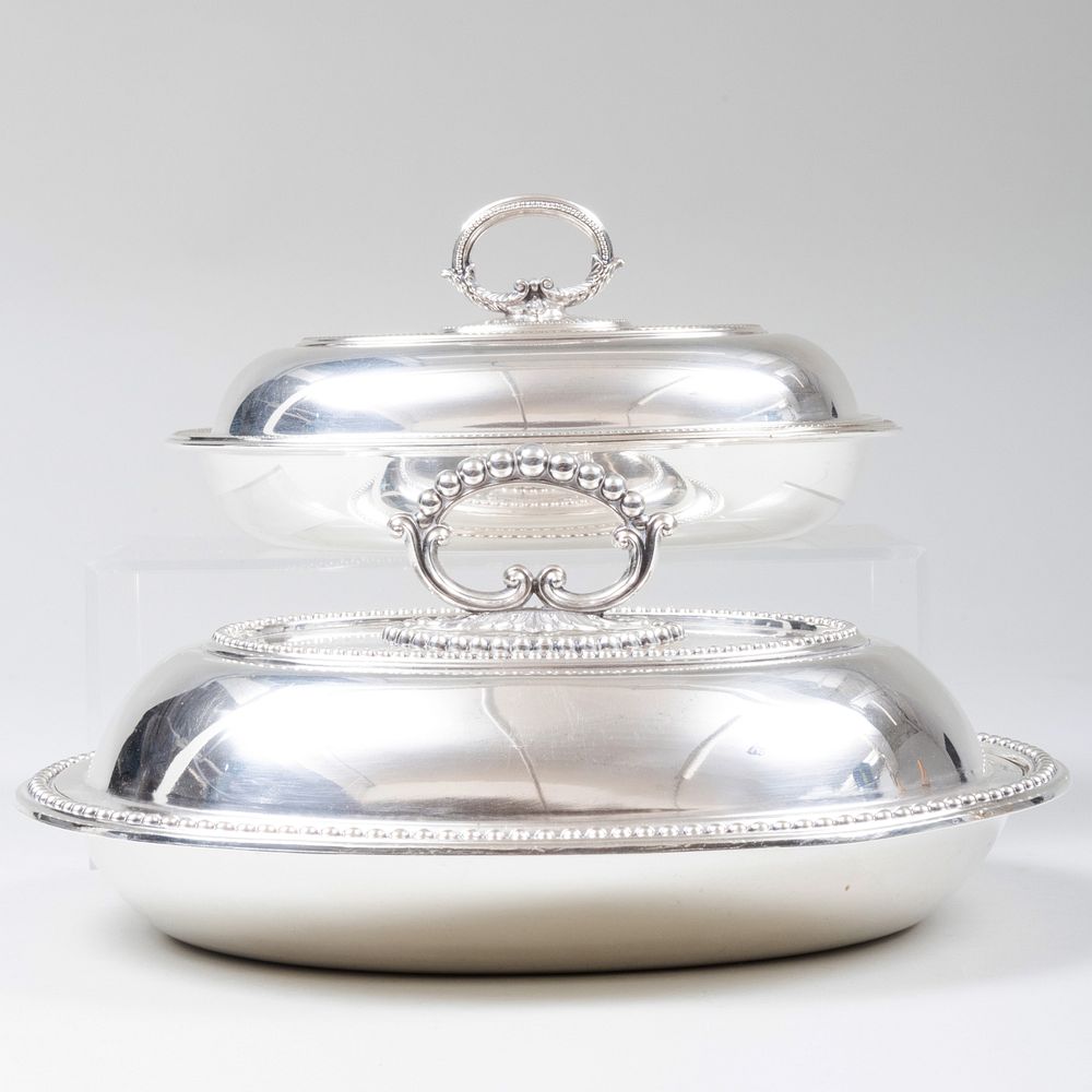 Appraisal: Two Silver Plate English Entr e Dishes The larger x