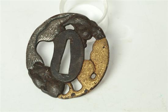 Appraisal: TSUBA Japan th- th century iron Circular with openwork images