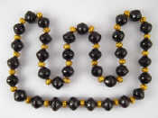 Appraisal: A garnet necklace comprising large faceted garnet beads approx mm