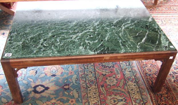 Appraisal: A th century coffee table the rectangular marble top within