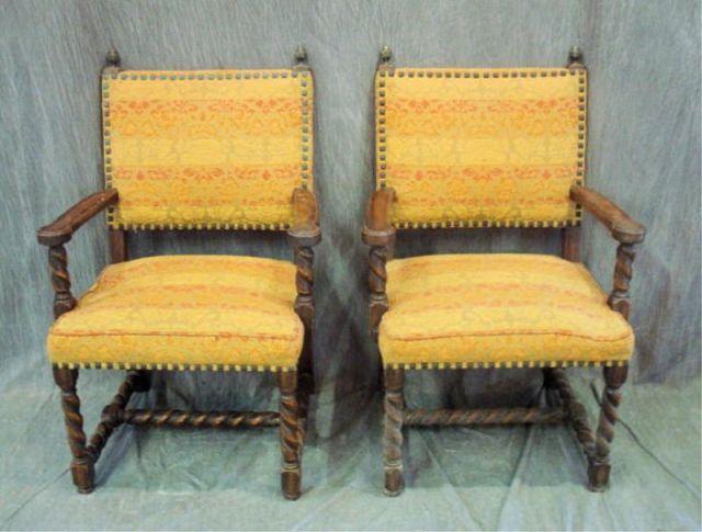 Appraisal: Pair of Upholstered Tudor Style Arm Chairs From a Westchester