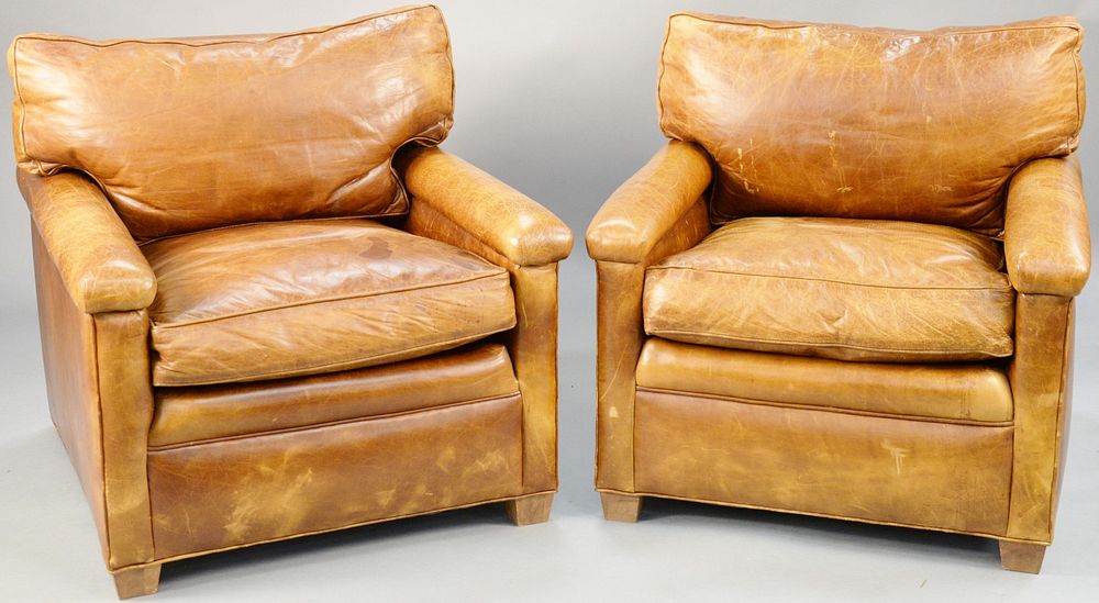 Appraisal: Pair of brown leather easy chairs ht in wd in