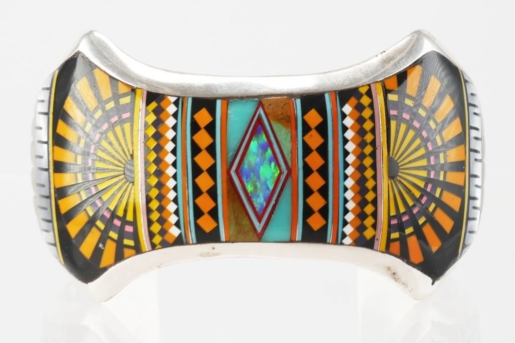 Appraisal: Sterling silver cuff bracelet featuring Native American style multi-colored design