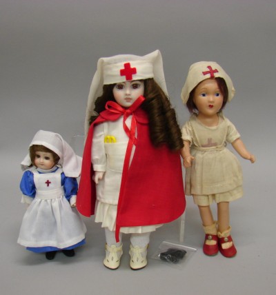 Appraisal: Lot of nurse dolls Antique unmarked compo doll with painted